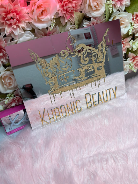 Engraved mirrored logo